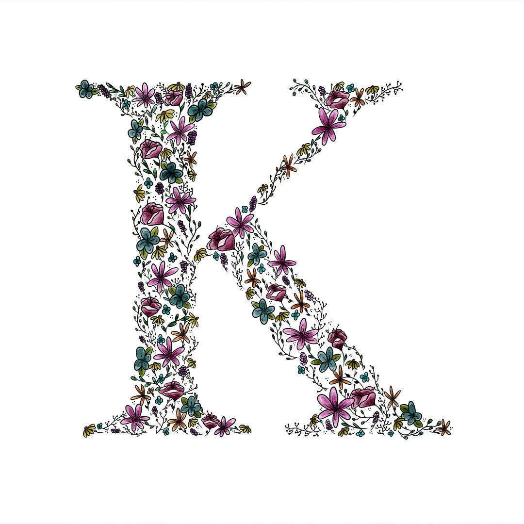 A collection of flowers and plants elegantly arranged into the shape of the letter K. The colors of the flowers are blue, pink, yellow, and orange.